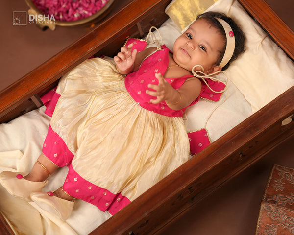 Chithira - Tissue Frock with Rani Pink Chanderi Buttas & Matching Accessories