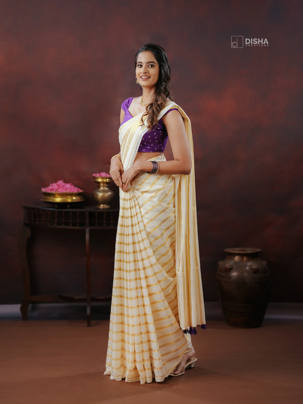 KEERTHI - Women’s Cream Kerala Kasavu Saree with Golden Stripes – Paired with Violet Chanderi Buttas Blouse
