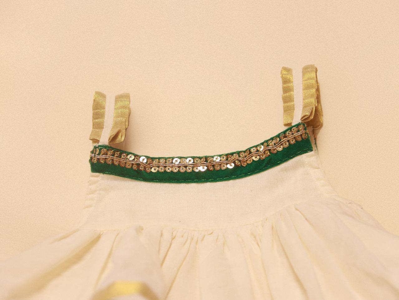 GIRLS FESTIVE KERALA KASAVU FROCK WITH GREEN LACE DETAILING